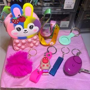 small crossbody 6 pc bundle with safety alarm and whistle.Includes AirTag holder
